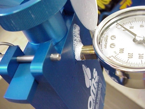 Check where the gauge screws into the chamber.