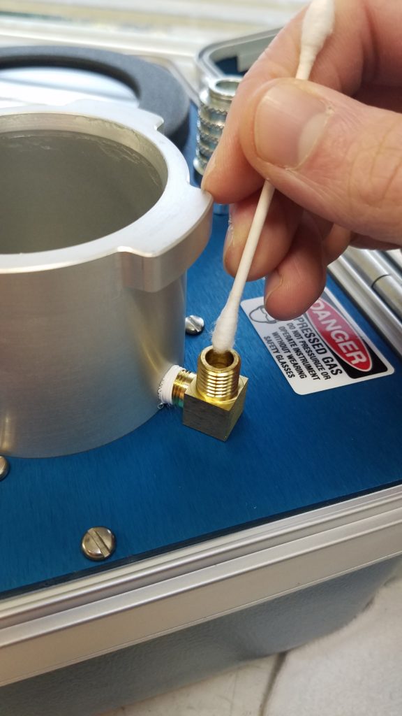 Use a cotton swab to clean inside the Safety Valve body