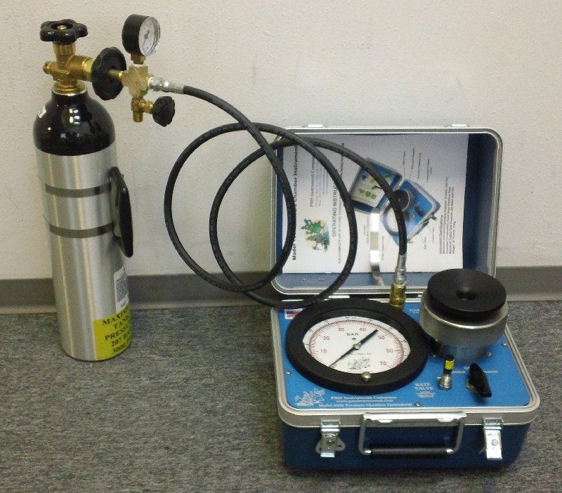 portable tank hooked up to a compression chamber