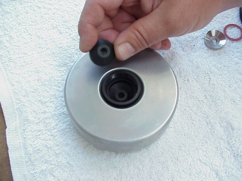 install the Compression Gland Gasket into the Compression Gland Base