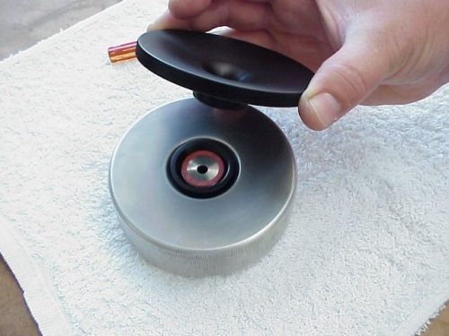 Install the Compression Gland Screw into the Compression Gland Base