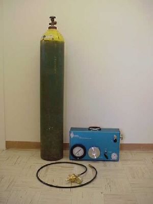 A Model 610 Pressure Chamber Instrument, a Nurse Tank, and a 6-Foot connector hose
