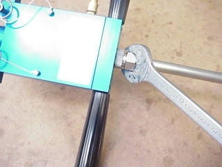 Loosen the fitting that holds the Pump-Up tube in place.