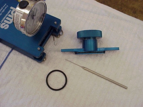 Petroleum Jelly, a large needle, and the Extra Buna 70 O-ring size (223)