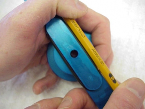 Use a pencil or flat long object to press the O-ring into place