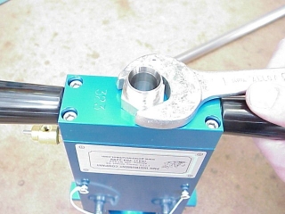 Remove the fitting that held the Pump-Up tube in place