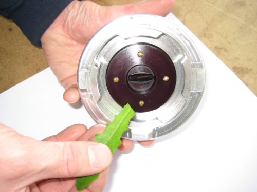 grass inserts into grass compression chamber