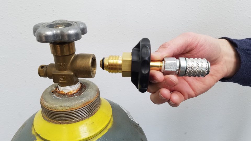 Screw the Supply Tank Adaptor into the Supply Tank