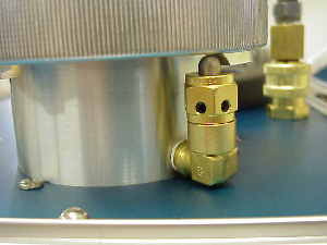 Then turn the lid back so that the cam is not blocking the piston