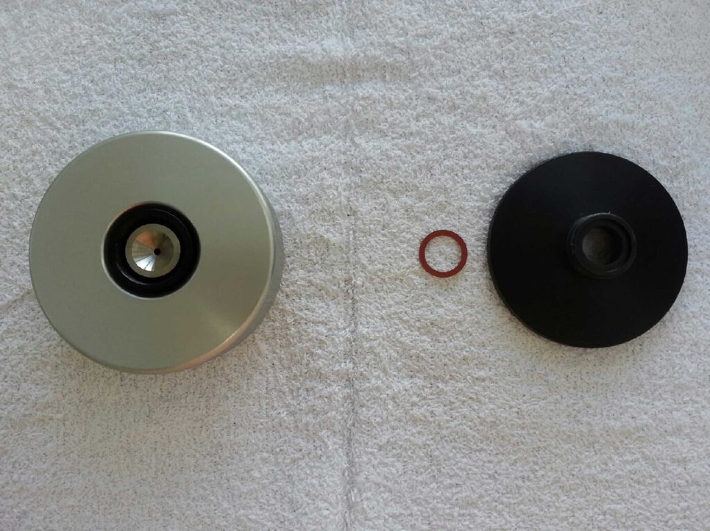 put in the almond compression gland insert with the flat side facing down